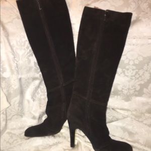 Knee high women’s suede boots.